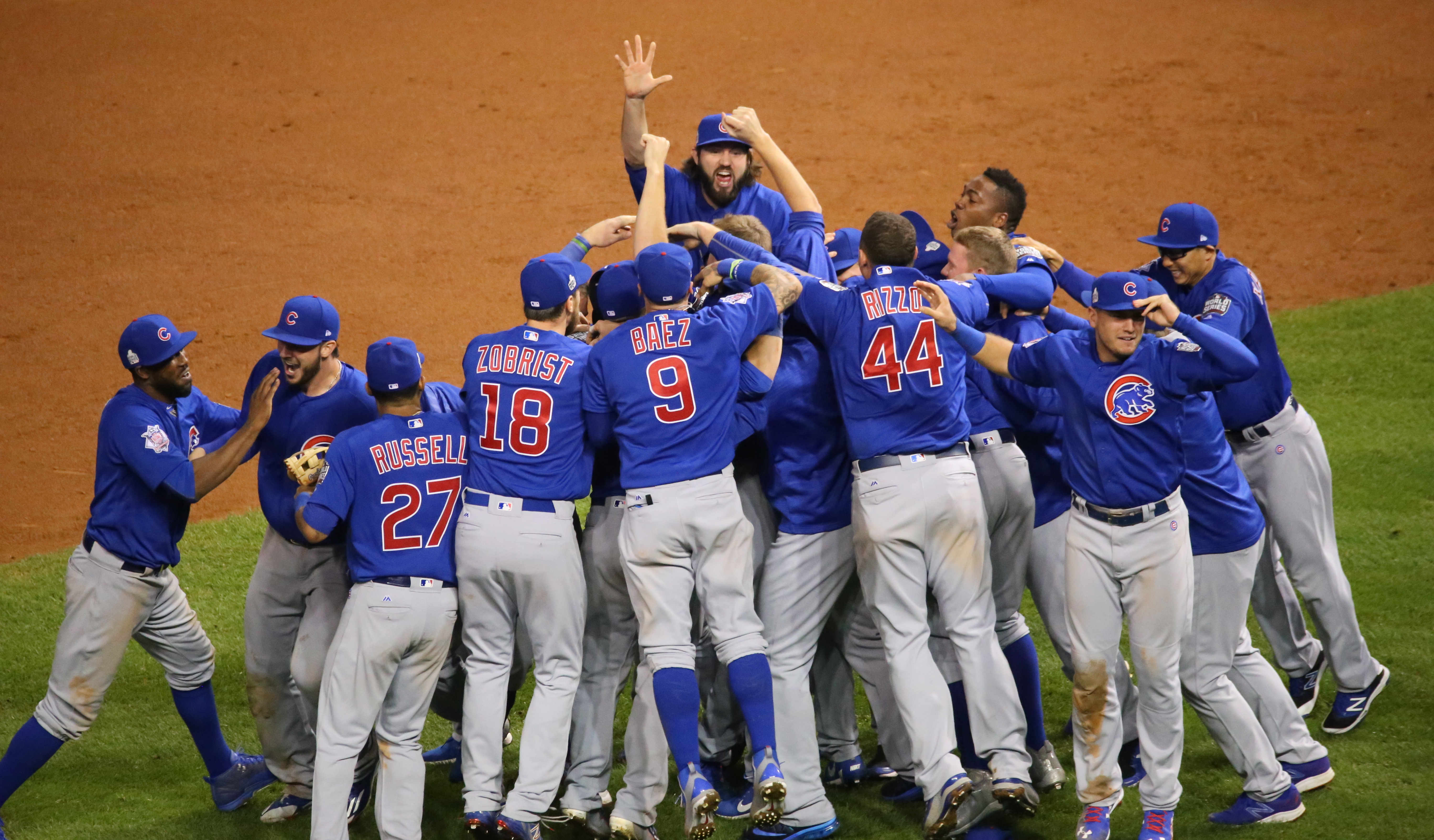 Chicago Cubs players celebrating the 2016 World Series championship.