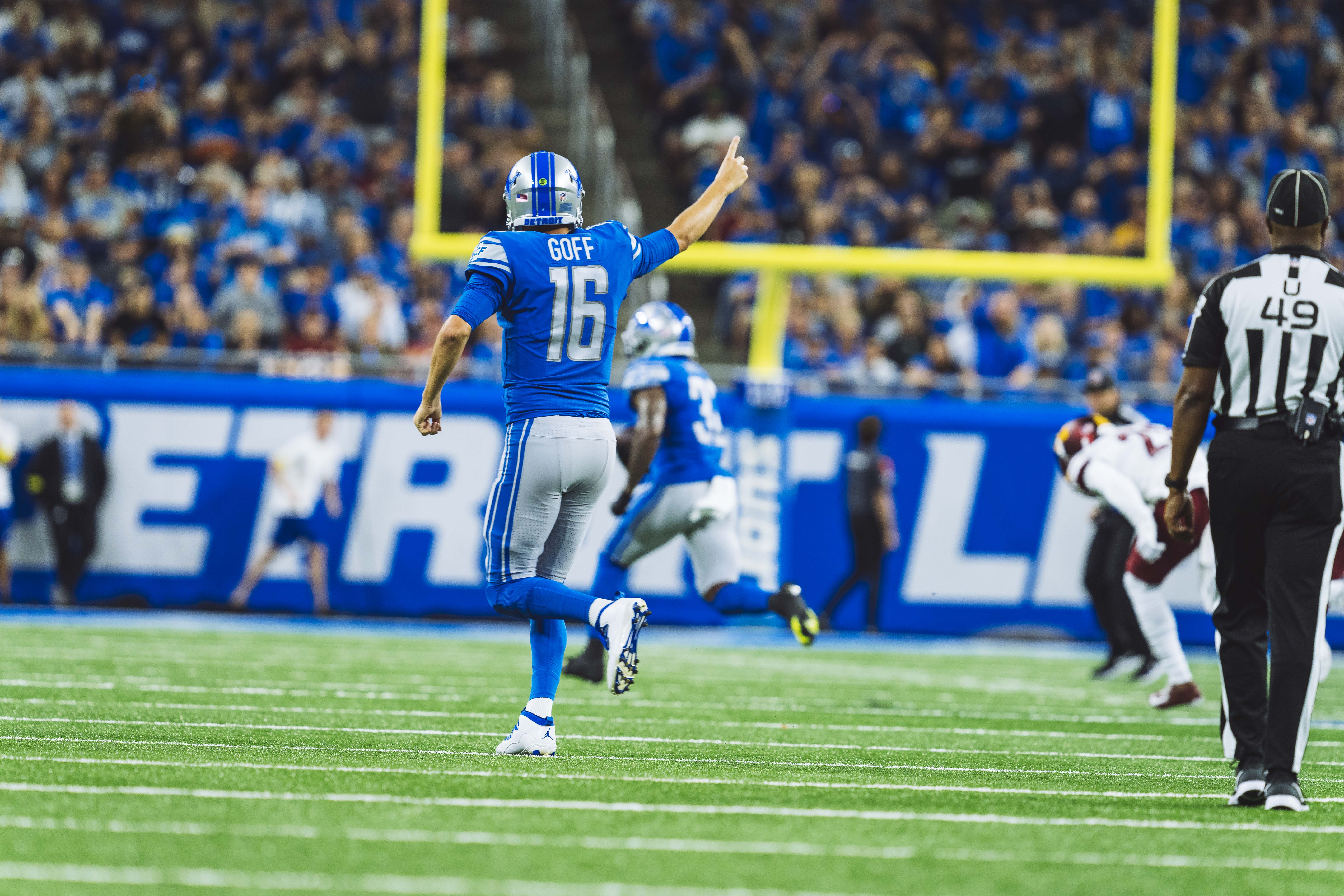 Jared Goff in a Detroit Lions uniform during a 2022 home game.