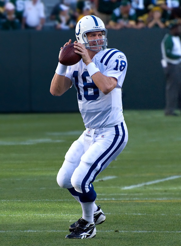 Peyton Manning in an Indianapolis Colts uniform preparing to pass during a 2010 game.